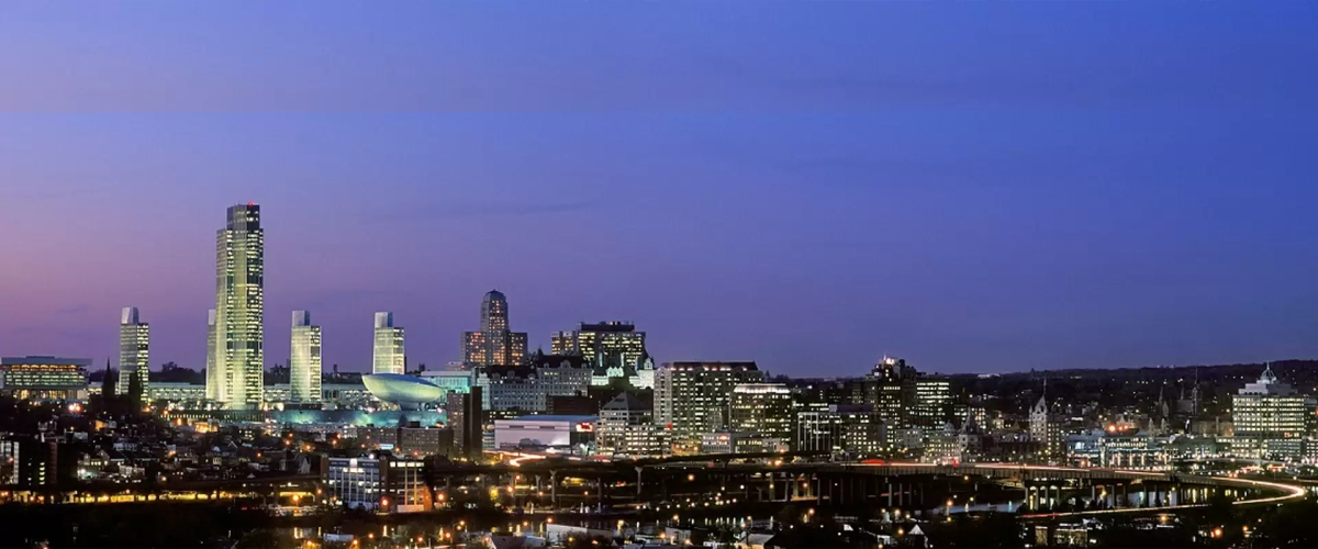 Skyline of Albany at blue hour with buildings lit up