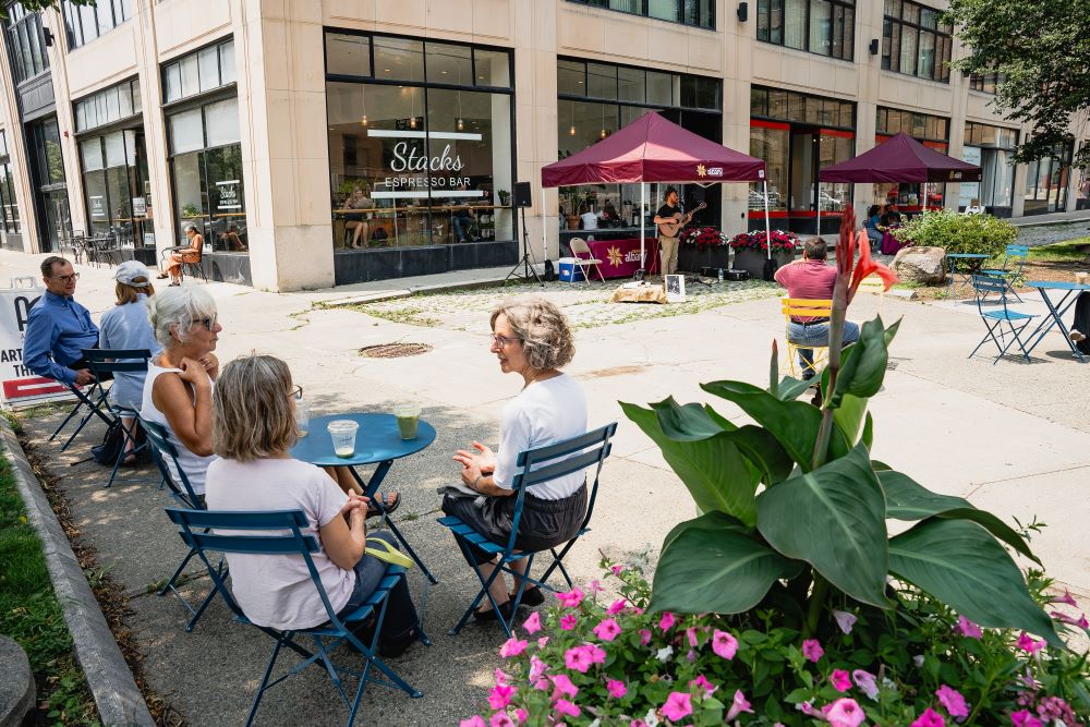 People enjoying a Tunesday concert at Jim DiNapoli Park