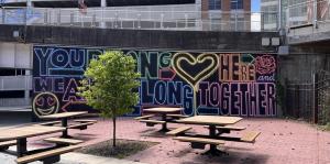 Photo of "Belonging" mural at Quackenbush Square