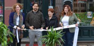 Ophelia's owner, Shane Spillenger, mayor Kathy Sheehan, executive director, Georgette Steffens, and Assemblymember Patrica Fahy cutting ribbon