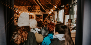 People entering a busy restaurant Downtown