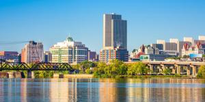 Skyline of Albany reflecting in Hudson River