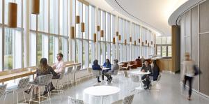 Circular hallway with 2-story windows and students