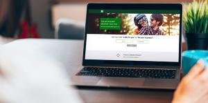 Laptop computer with TD Bank website on screen