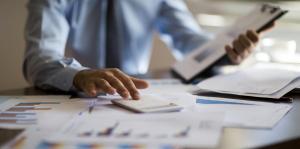 Man doing taxes at desk