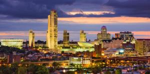 Albany, NY skyline at night with dramatic sky