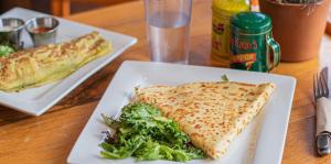 Plate with a crepe and side salad 