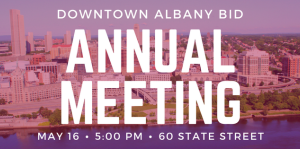 Stylized photo of Albany as taken from a drone, with text over it that reads "Annual Meeting"