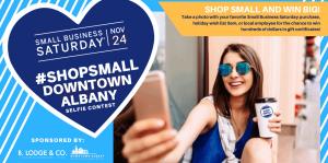 Small business saturday graphic, blue heart with the hashtag shopsmallwithus in the center