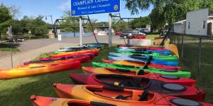 Colorful kayaks line the waterfront