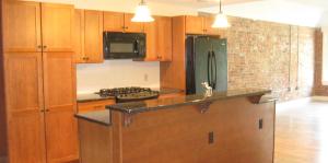 Photo of the kitchen space of a residence at The Meginnis Flats.
