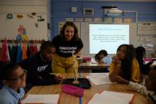 Teacher in classroom with students