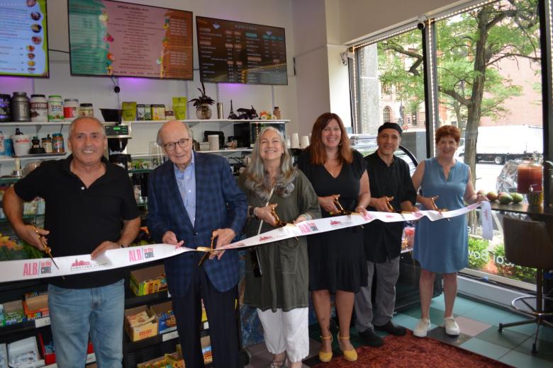 People cutting ribbon at the ceremony 