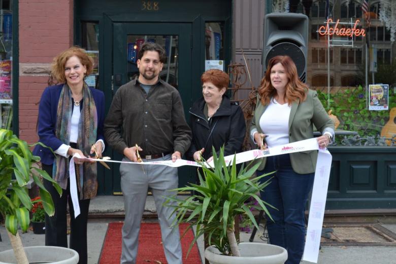 Ophelia's owner, Shane Spillenger, mayor Kathy Sheehan, executive director, Georgette Steffens, and Assemblymember Patrica Fahy cutting ribbon