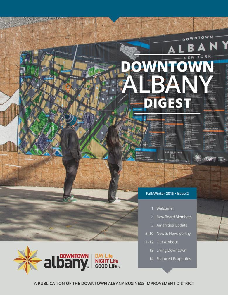 Downton Albany Digest cover, including an image of passerby's looking at a large, street-sized map of the district pasted on the side of a building.