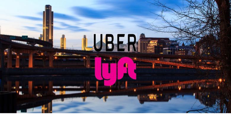 Image of downtown albany with both the uber and lyft logos over top