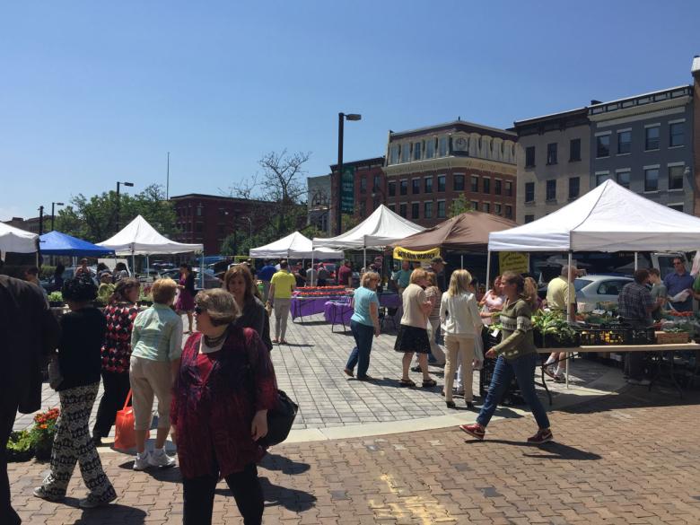 Outdoor farmers market crowd